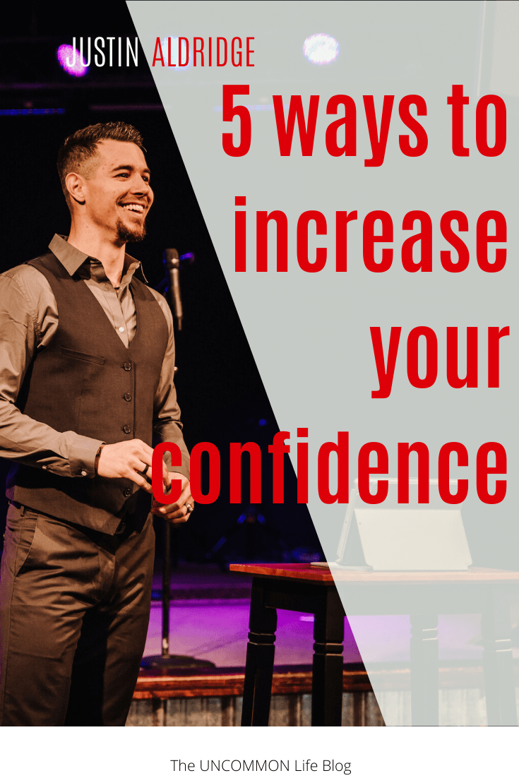 Man staring off to the right smiling with the words "5 ways to increase your confidence" in red font.