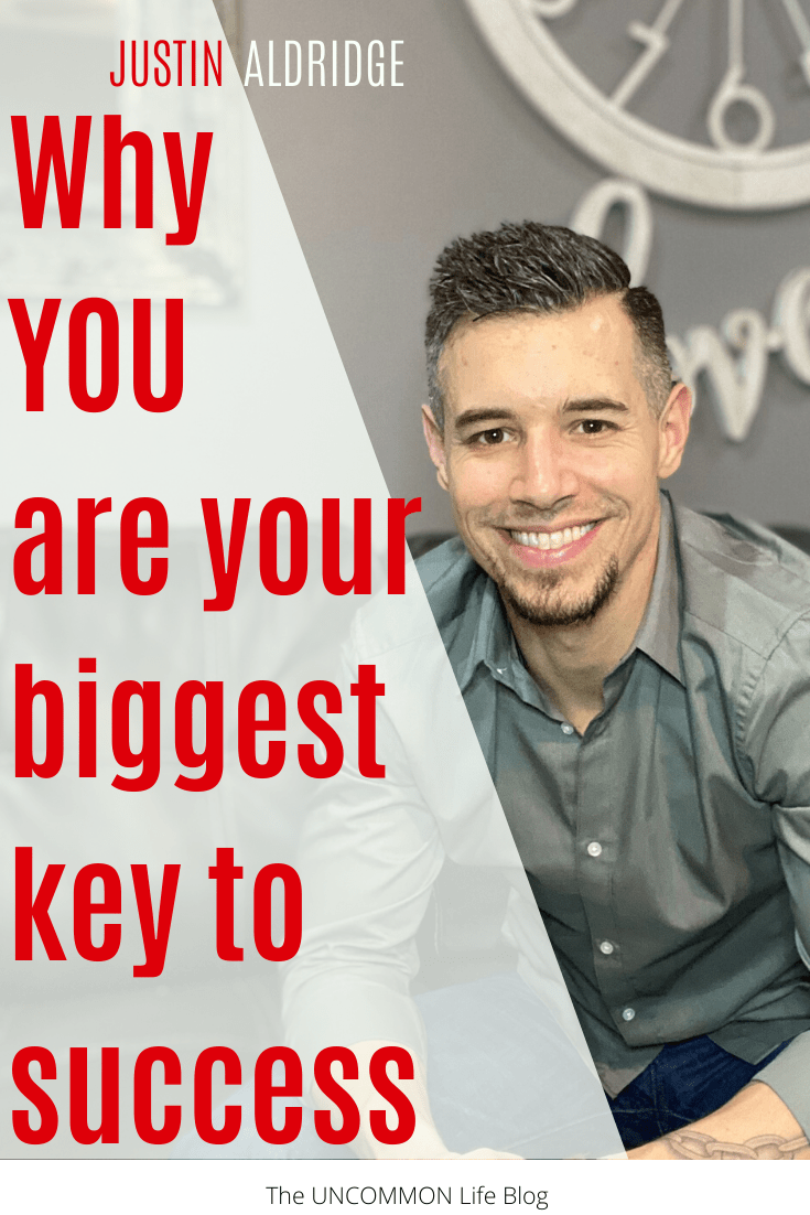 Man smiling with the text "Why YOU are your biggest key to success" in red text on the left side.