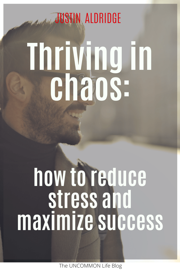 Image of a man looking to the right in the background behind the text, "Thriving in chaos: how to reduce stress and maximize success" in white font.