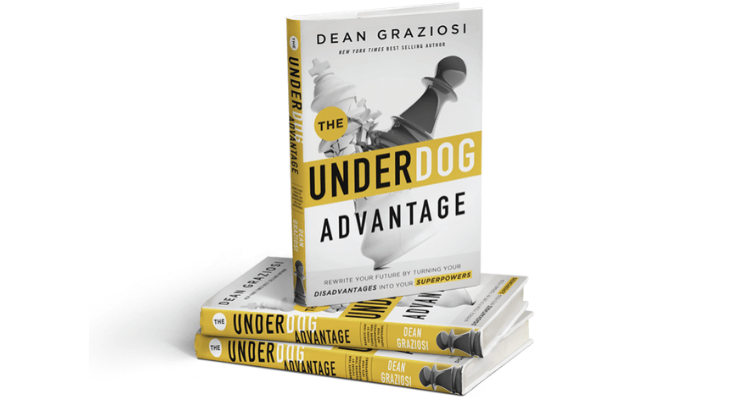 Book with the title "The Underdog Advantage" standing vertically on top of 2 copies of the same book laying down horizontally.